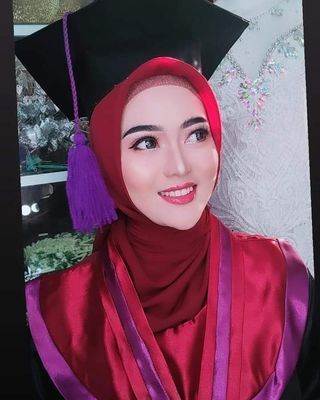 EVRYENI JUSMADI, S.Pd,M.Pd